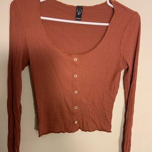 Orange blouse with buttons